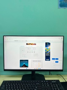 A desktop monitor and keyboard on campus, with a web page loaded in the browser
